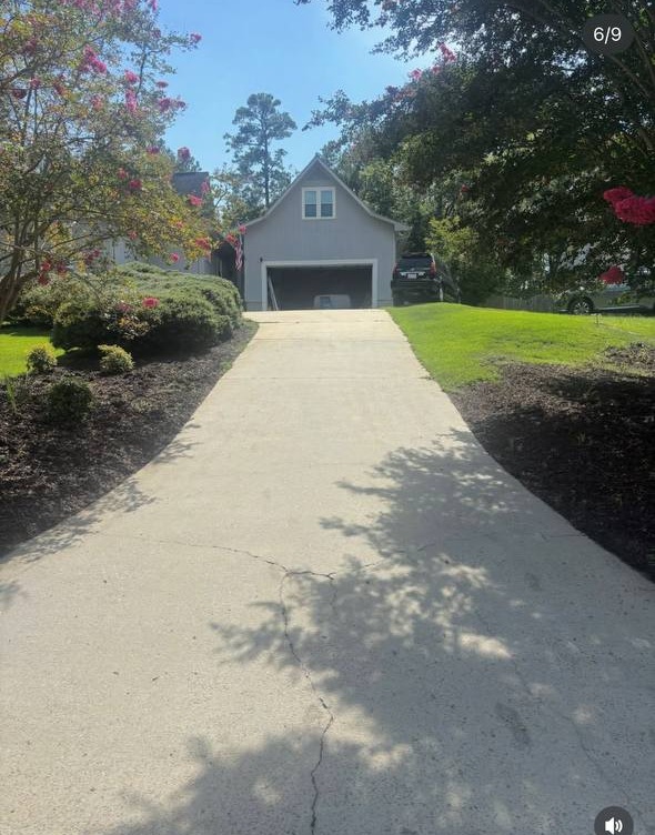 Clean driveway after Top Tier Exteriors